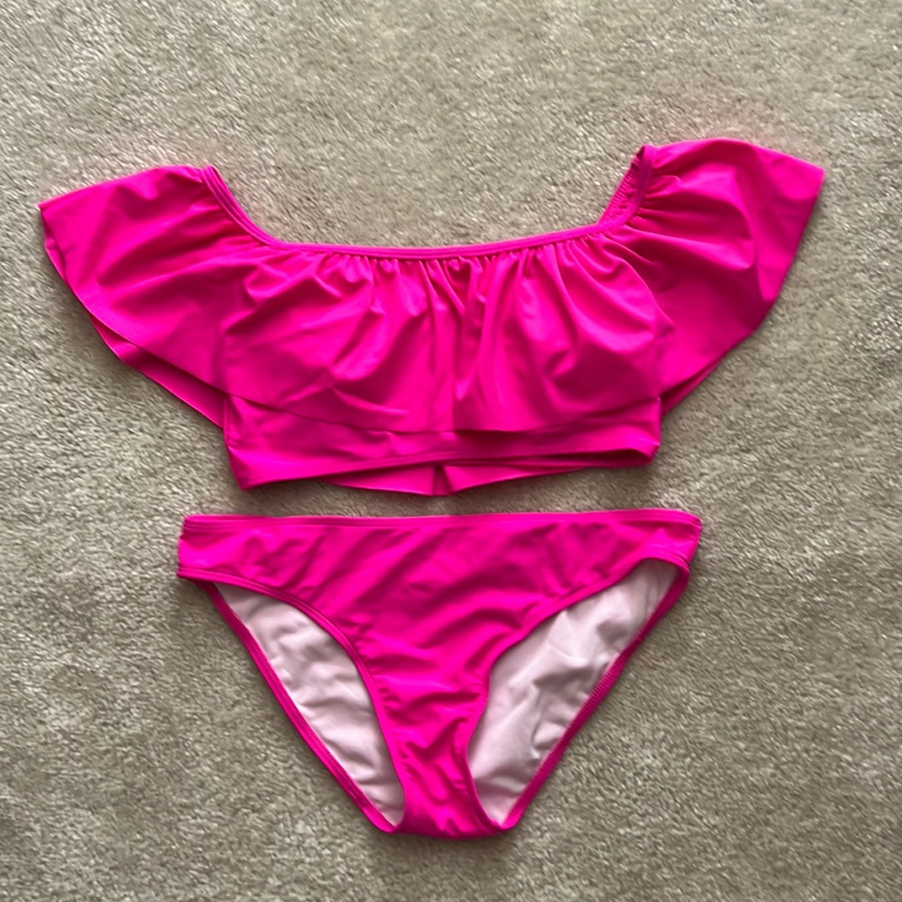 Bright pink ruffle swim suit